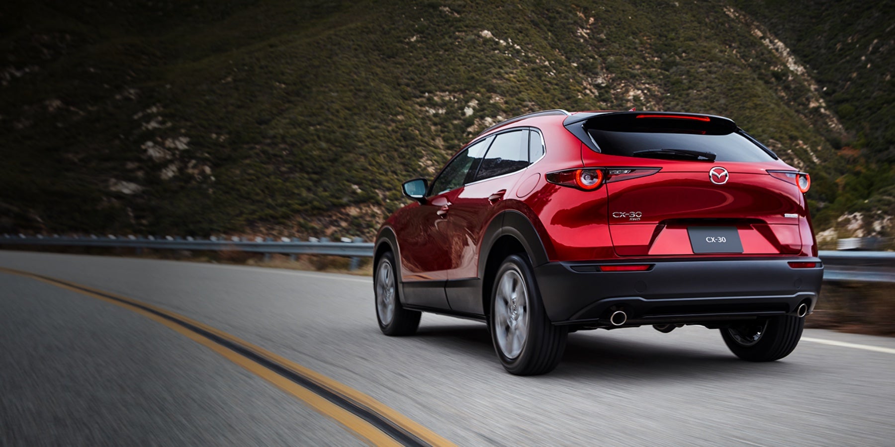 Red 2020 Mazda CX-30 Driving on the road | Irwin Mazda in Freehold Township, NJ