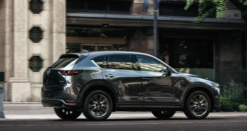 Grey 2020 Mazda CX-5 Driving on the road | Irwin Mazda in Freehold Township, NJ